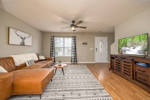 Our family room with flatscreen SmartTV and a seating