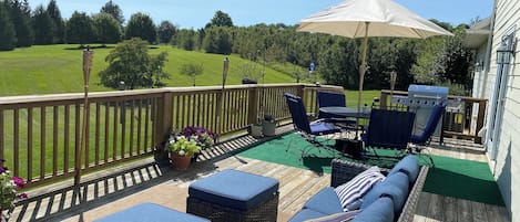 Deck with views of the backyard and Par 3. Great space to entertain and relax