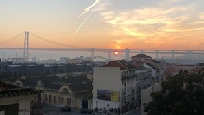 The magnificent view from the living room at sunset, with the "25 de Abril" bridge as background #view #sunset #portugal #pt #lisbon