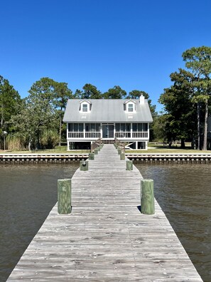 Bay front cottage, just steps from the pier and boathouse.