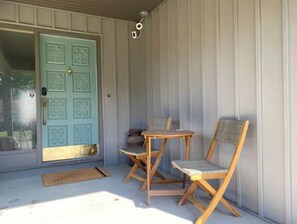 Front porch perfect for morning coffee!