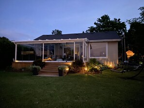 Back of the home showing sunroom 