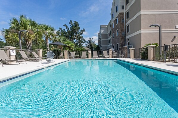 Soak up the sun by the outdoor seasonal pool.