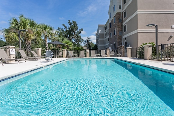 Soak up the sun by the outdoor seasonal pool.