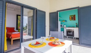 Villa Lagon chambre et cuisine ouvertes sur la galerie