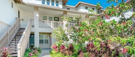 Here is the front of the condo. Beautiful and lush greenery all around