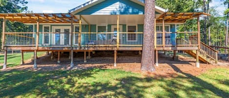 large yard with covered deck