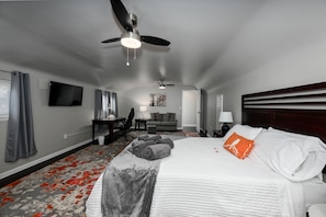 Bedroom 1 - Queen bed, TV, dresser, work station, alarm clock, USB charger fans 