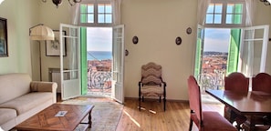 Comfy sofa and panoramic sea view from dinner table for 8 persons. 