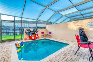 Splash into happiness in our screened-in pool, where the only thing better than the water’s embrace is the lack of bugs. Swim close to the magic, and don't be surprised if you hear distant Disney tunes on the wind!