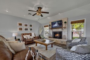 Cozy fireplace in the spacious living room.