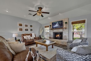 Cozy fireplace in the spacious living room.