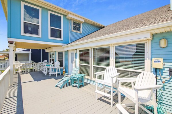 Relaxation on the Balcony - After a long day of fun, relax on the comfortable couch or gather around the table with friends and family to plan your next day's adventures.