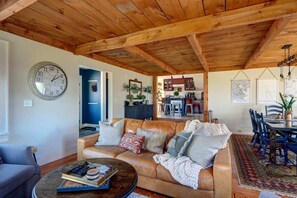 The living room is open to the dining room