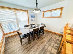 Dine in style with seating for six at the spacious dining table, complemented by additional bar seating for four. This versatile space is perfect for family meals, game nights, or casual gatherings after a day exploring the beautiful Pacific City coast