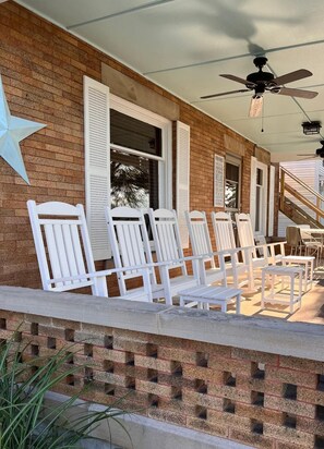 Front porch w/ rockers gazing at the lake or soaking in the breeze.