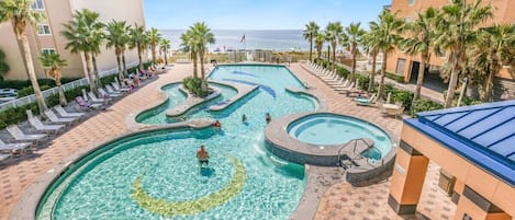 Beach club features sun deck, lounge area, pool, hot tub, lazy river, & restrooms