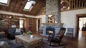 ...as well as a cathedral ceiling, skylights, and a cozy gas-fueled fireplace.