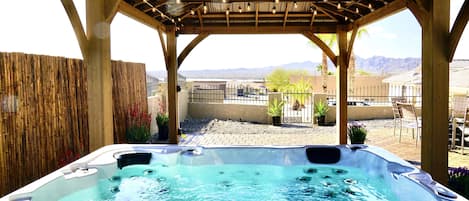 Beautiful and relaxing backyard with hot tub and mikes of views!