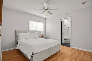 Queen sized bed with premium mattress and bed linens.