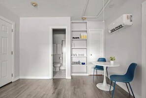 Dining area and walk-in shower.