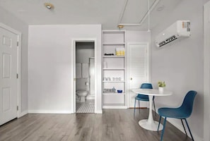 Dining area and walk-in shower.