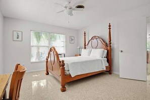 Queen sized bed with premium mattress and bed linens.