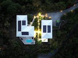 Night time Aerial View feat. Cottage (right) and Mainhouse w/ pool (left)