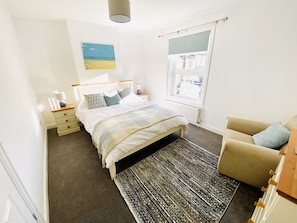 Master bedroom with king-sized bed