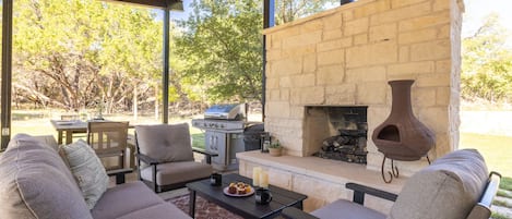 Covered patio with living and dining areas