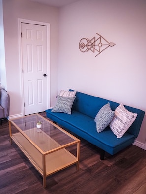 We have a queen-sized sleeper sofa large enough for two guests.