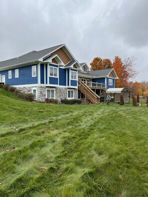 Back of home. Plenty of area to play with a few fire pits, playscape.