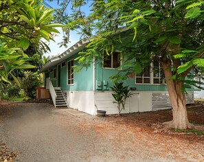 Beautiful Royal Poinciana and free private parking as you enter Kona Surf House