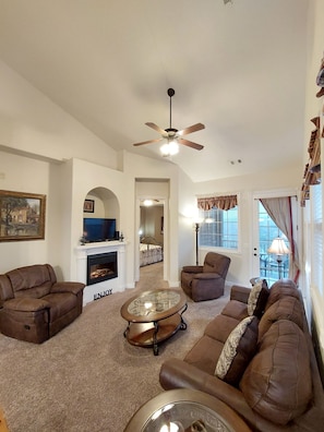 Your spacious living room at a glance! Absolutely beautiful! All new furniture!