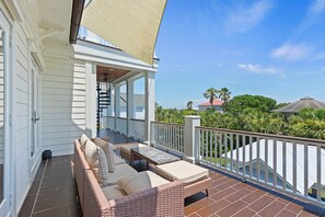 Balcony overlooking pool area.