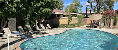 Unit in background, adjacent to pool