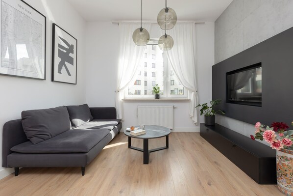 Spacious living room with full equipment.
