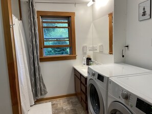 Bathroom on the first floor with washer and dryer