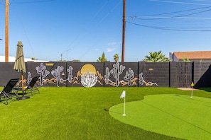Large turf play lawn and stylish mural