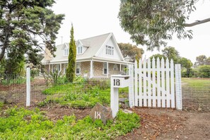 The entry gate to the fully enclosed yard.