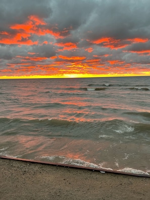 Enjoy stunning sunsets from your private beach.