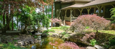 The front entrance of "The Iconic Gem" overlooks the Japanese pond and garden. 