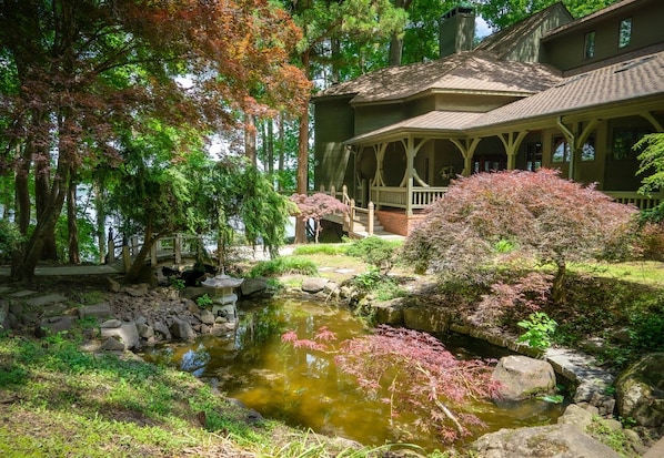 The front entrance of "The Iconic Gem" overlooks the Japanese pond and garden.