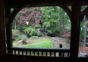 The front porch and walkway overlooking the Japanese garden.