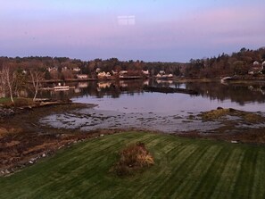 Sunset from balcony at low tide.