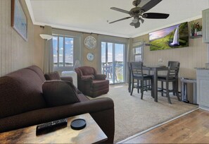 Snuggle up in the comfy sofa bed and enjoy the mountain views or unwind while watching the 55" TV.