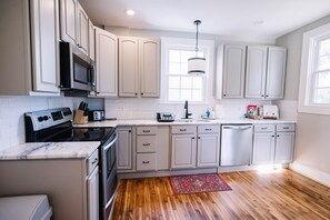 Enjoy cooking your favorite meals in this fully equipped kitchen 