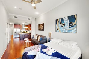 Very nice stylish 700+sq ft LOFT Studio Apt full of amenities, Rooftop pool, Fitness Center in the building, in unit washer dryer, motorized shades and plenty of comforts.  Reliable WIFI included as well.