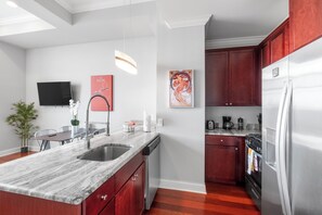 Functional and well-stocked kitchen with all the essentials to make you feel at home.
