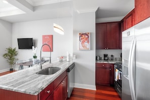 Functional and well-stocked kitchen with all the essentials to make you feel at home.
